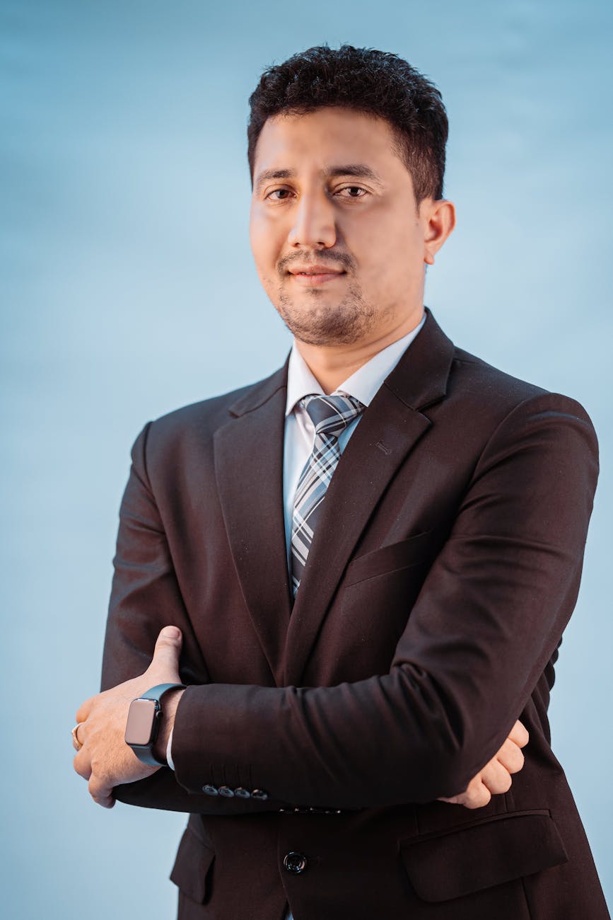 portrait of a man with his arms crossed