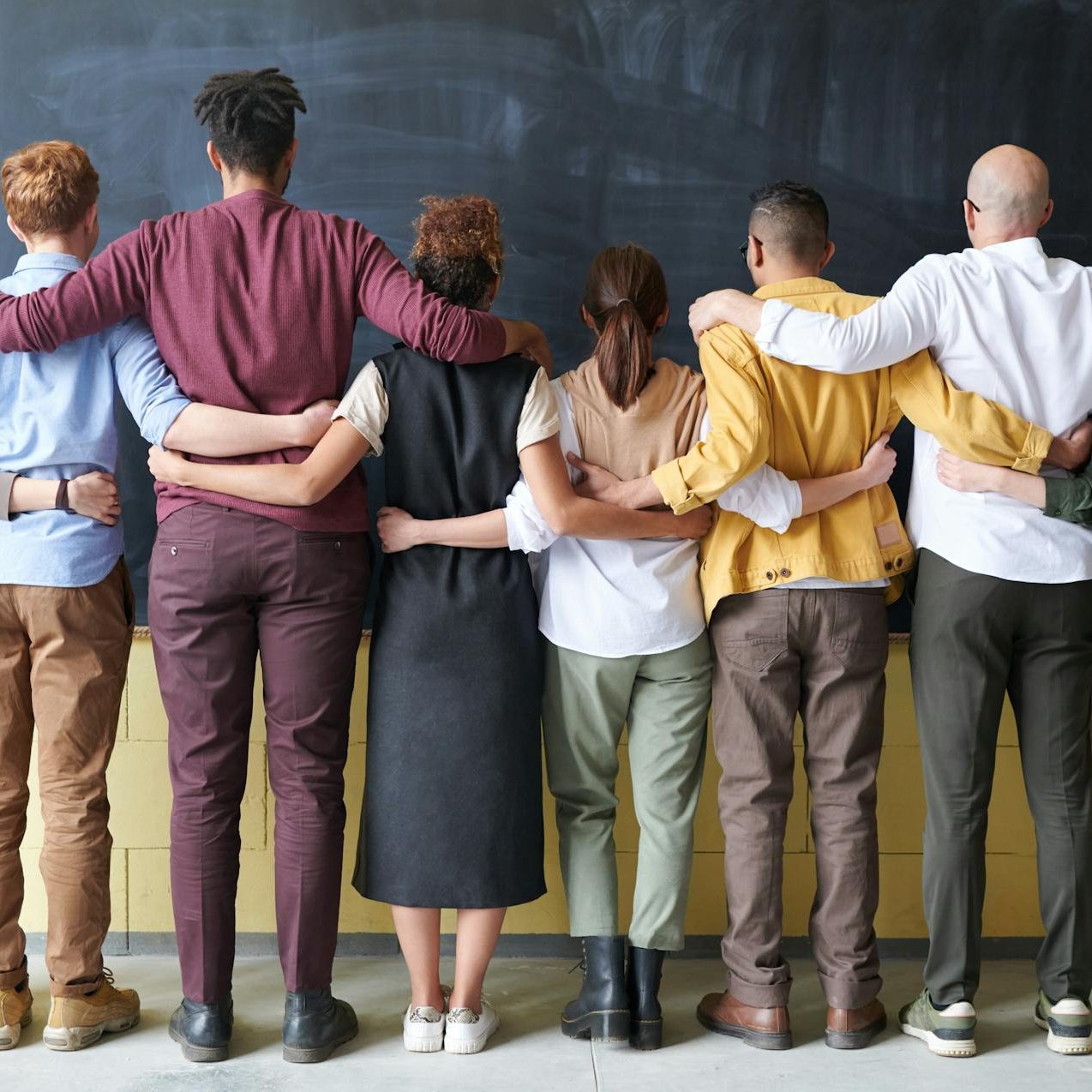 group of people standing indoors
